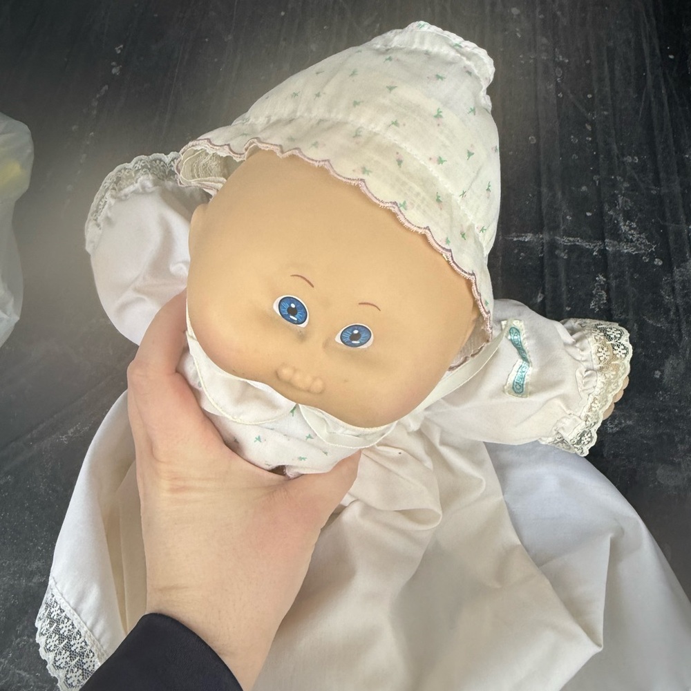 Adorable Baby Doll with Blue Eyes